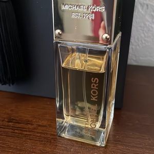 1.7 fl ounces Michael Kors Sexy Amber scent